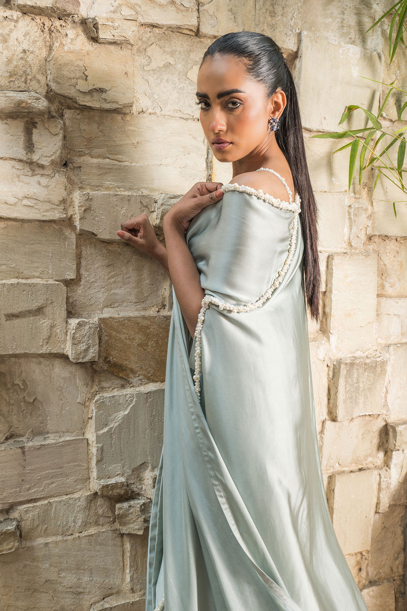 Grayish blue cape with embroided bustier with skirt